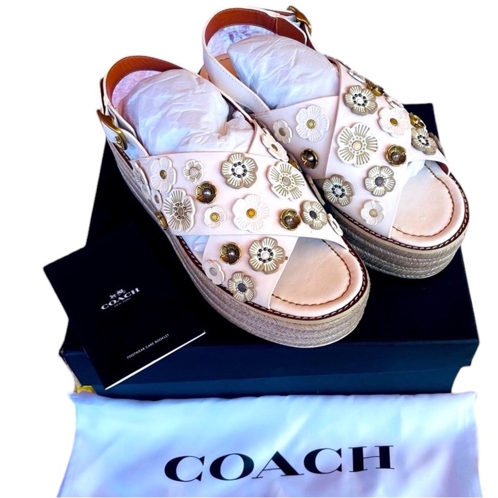 Coach Metallic white espadrille platform sandals with metallic flower studs.